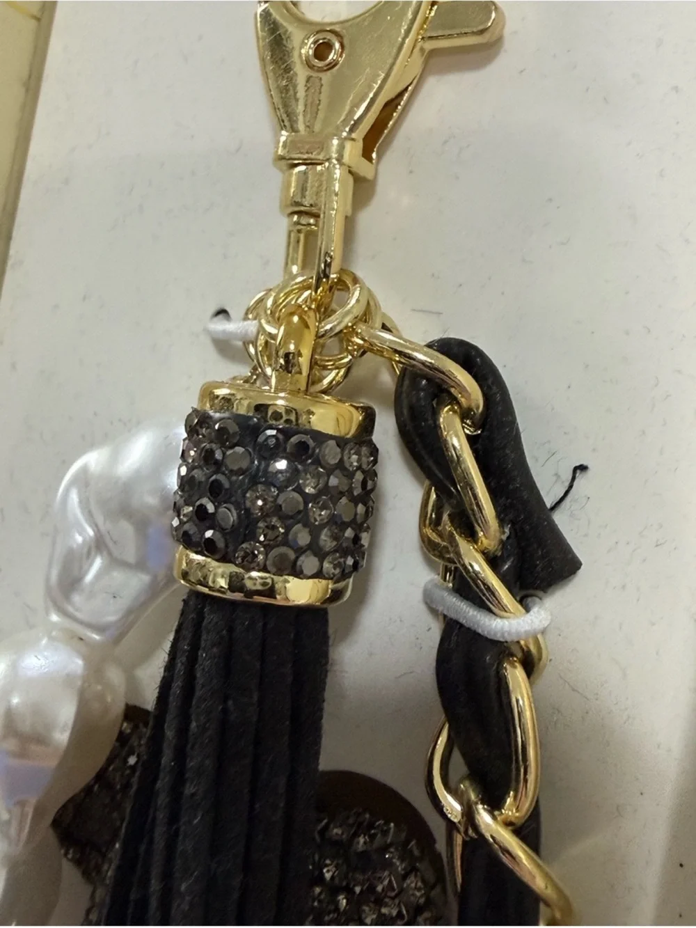 Eye Candy Black rhinestone bag charm key chain with faux pearls and gold chain